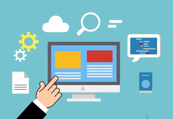 hand pointing at a monitor showing a website
