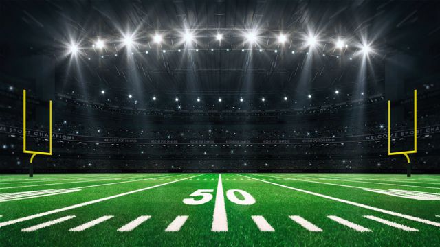 Football field with yellow goalposts 